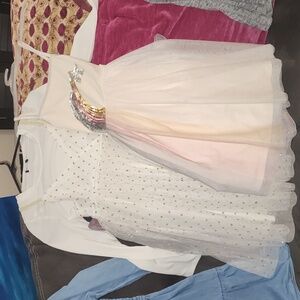 Two girl dresses one new with tags size 10/12 L